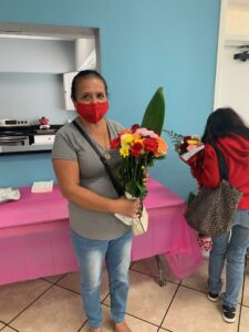 Maria celebrating Valentine’s Day with her Project ReachOut family
