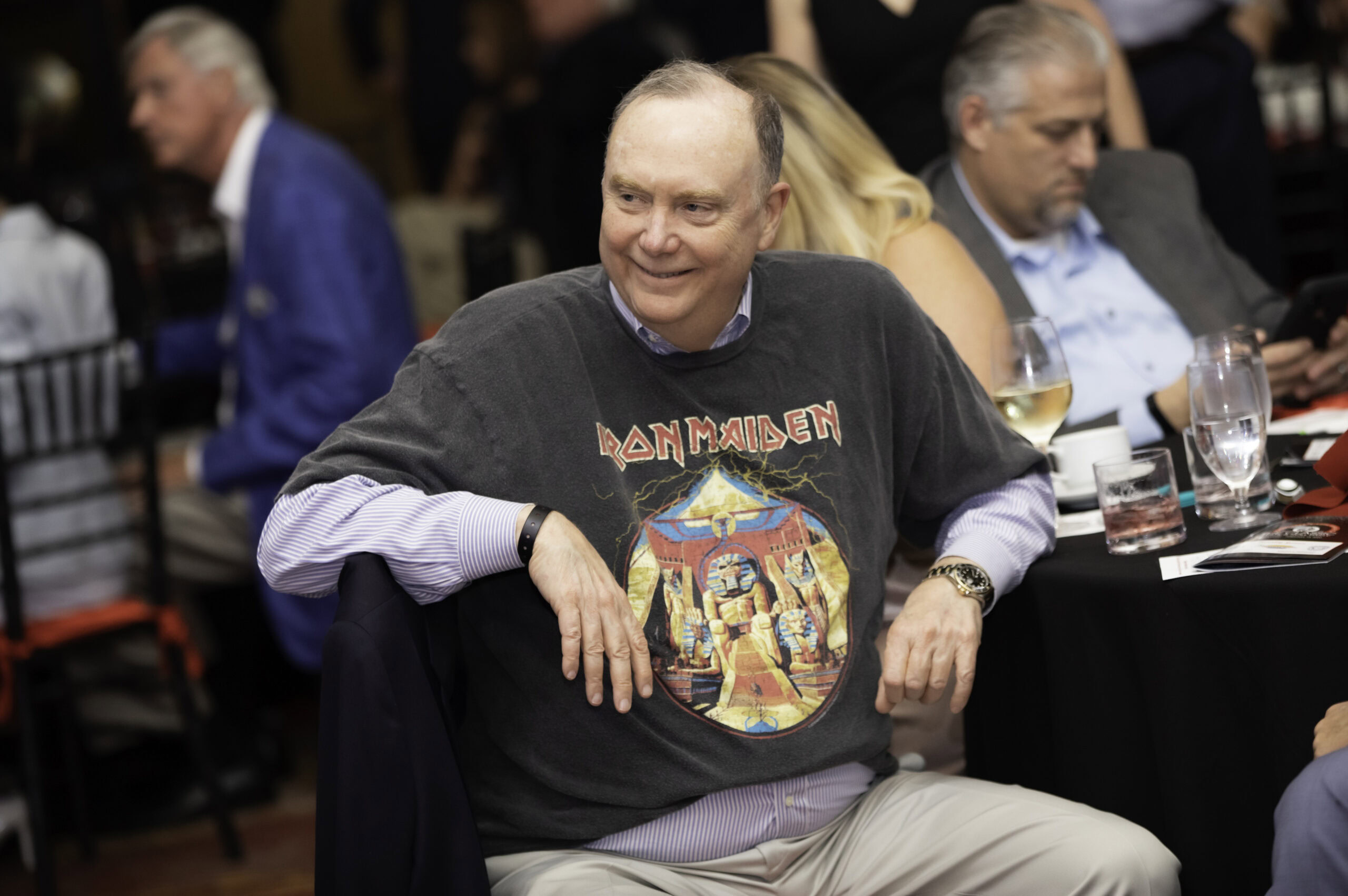 man wearing Iron Maiden shirt